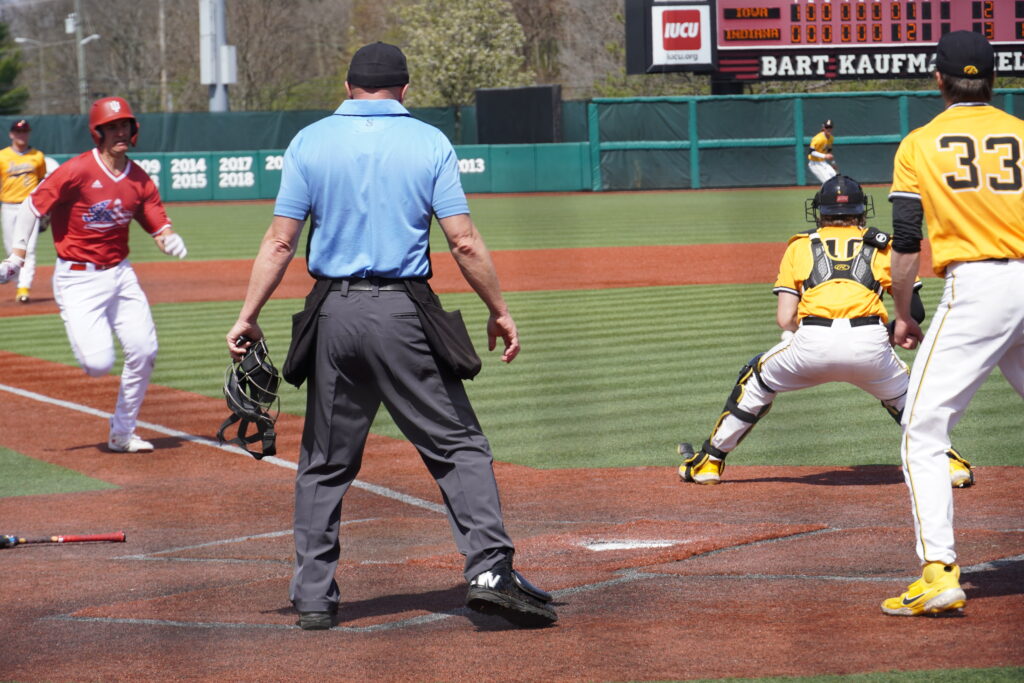 Peter Serruto running to home plate