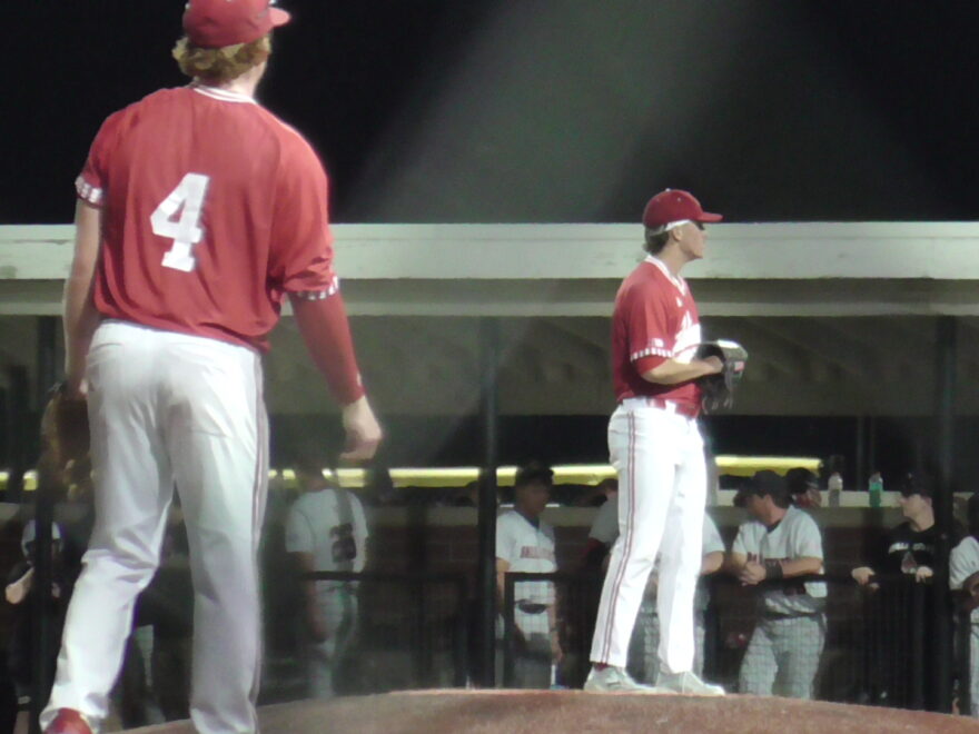 East Carolina transfer pitcher Ian White, Jr., prepares to toss against Ball State at Grand Park Diamond 5 in Westfield, IN on October 3rd, 2025 while third baseman Will Moore looks on.