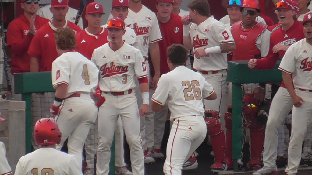 Team celebrates Will Moore's 3-run home run